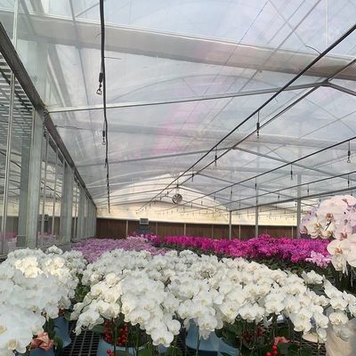Invernadero de iluminación controlada por rociador de agua de doble capa para soluciones de plantación